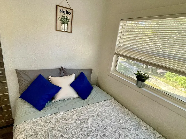 Cozy bedroom by the entrance door; it has 3 windows that make it bright!
Includes nightstand, wardrobe & mirror