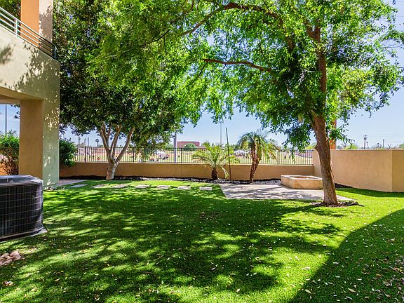 Fully landscaped backyard with new turf, sprinkler system and large, oversized trees that keep the backyard shaded for majority of the day.