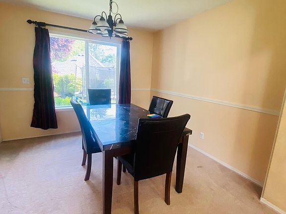 Dining area. Curtain included