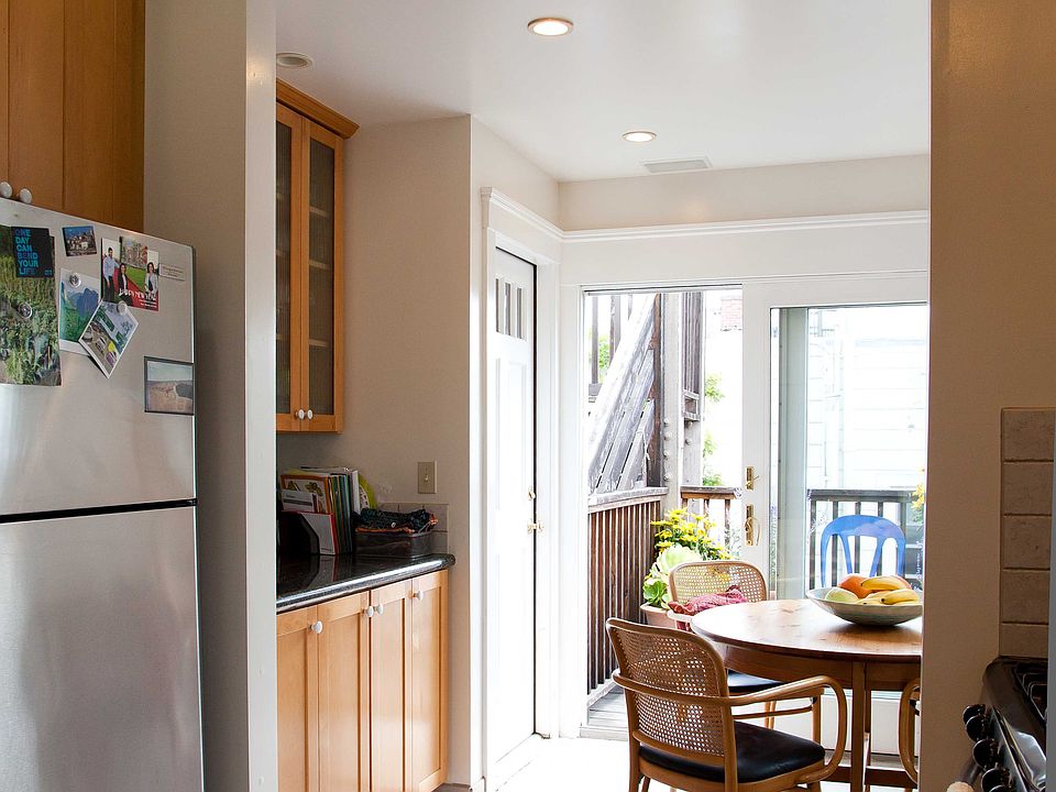 Kitchen (in unit washer dryer behind cabinet doors to left of table)