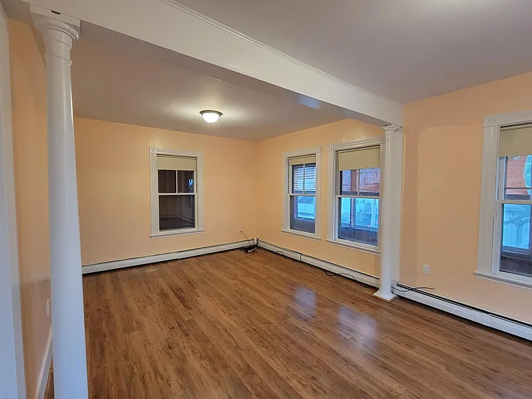 very large peach bedroom view 3