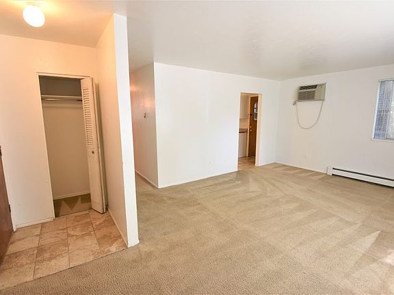 Living Room with entryway and closet