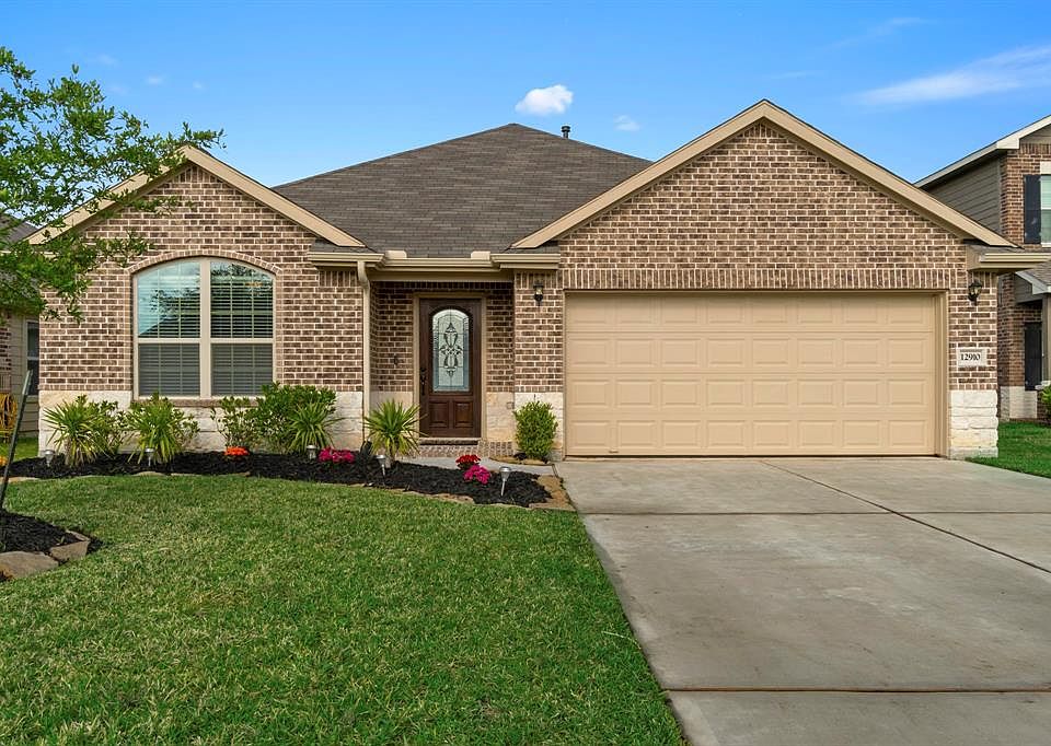 Welcome home to 12910 Spruce Circle. The stone and brick combo and updated landscaping make this one a showstopper.