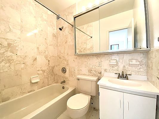 5th image of 67 E 3rd St APT 1A