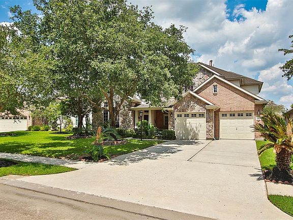 The home has an extended driveway, making parking easy.
