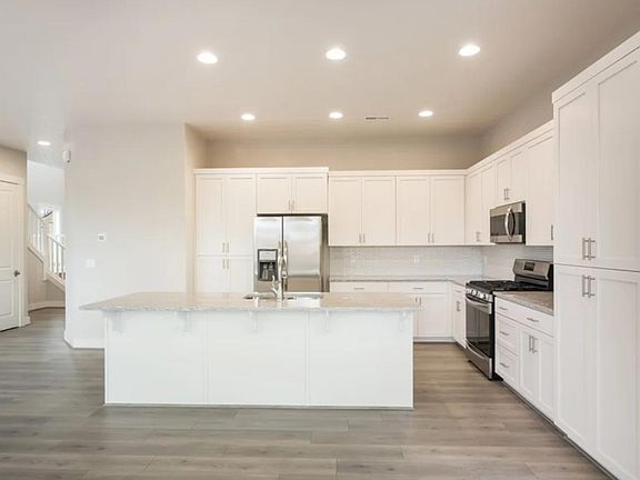 Model kitchen. Actual kitchen has light brown cabinets