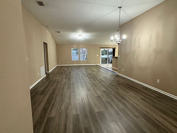 Fresh LVP flooring throughout main living area and kitchen.