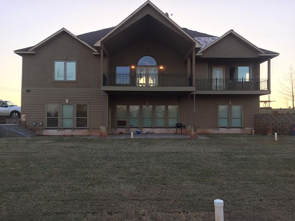 Back of the house.  this unit is the lower level with many w