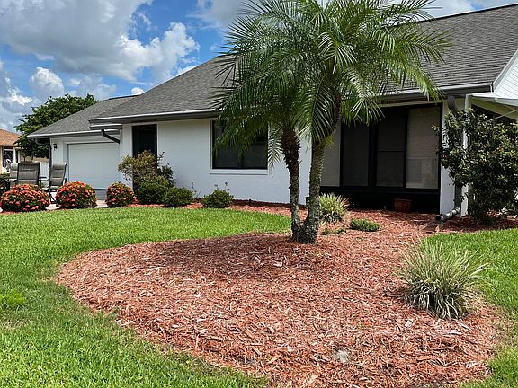 Stand alone house -- not a villa. Two car garage with motorized roll down screen. Glass and screened sunroom. Screened entry. Enjoy gentle breezes through the home.
