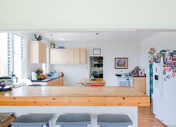 This wooden kitchen countertop was custom made by a previous tenant.