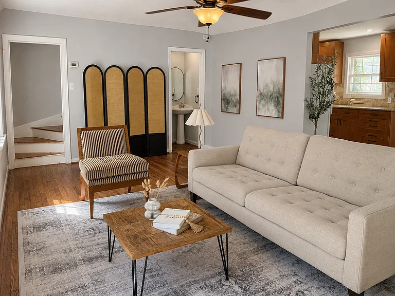 Living room with furniture provided