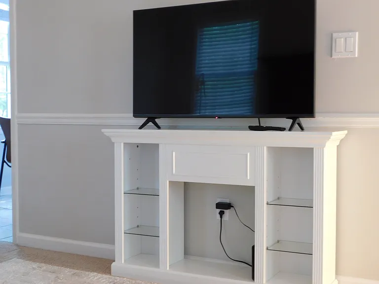 LG LCD TV set with remote control in the Living room