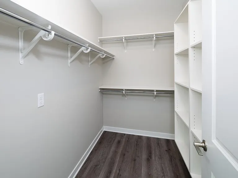 New West Phase - Finish Package IV Bedroom with walk-in closet and custom shelving