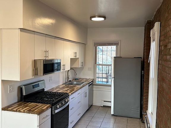 5th image of 1357 N Downing St APT 6