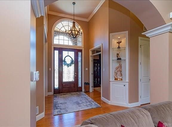 Tall ceilings, 8 ft doors, custom woodwork and trim.