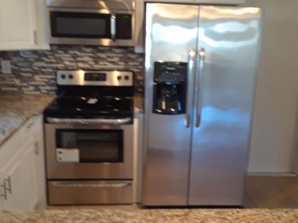 New Stainless appliances and granite counter tops.