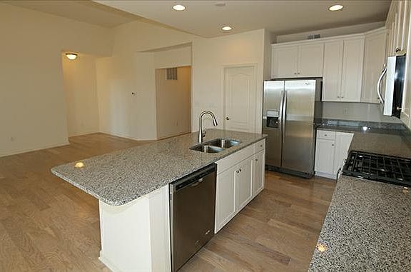 Granite Countertops in kitchen with Stainless steel appliances