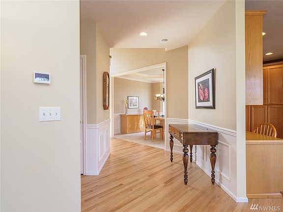 The gleaming hardwoods, wainscoting and 9' ceilings give this home a very luxurious and spacious feel. 