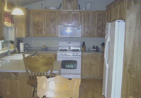 Kitchen with Cherry cabinets