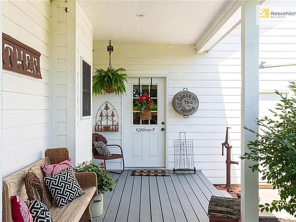 Side porch, door to mud room