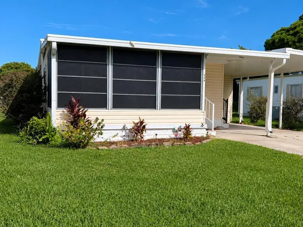 1009 Buttonwood St, Barefoot Bay, FL 32976