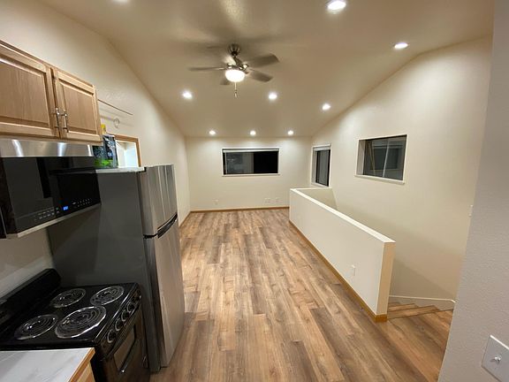 New flooring, paint, and updated lights throughout