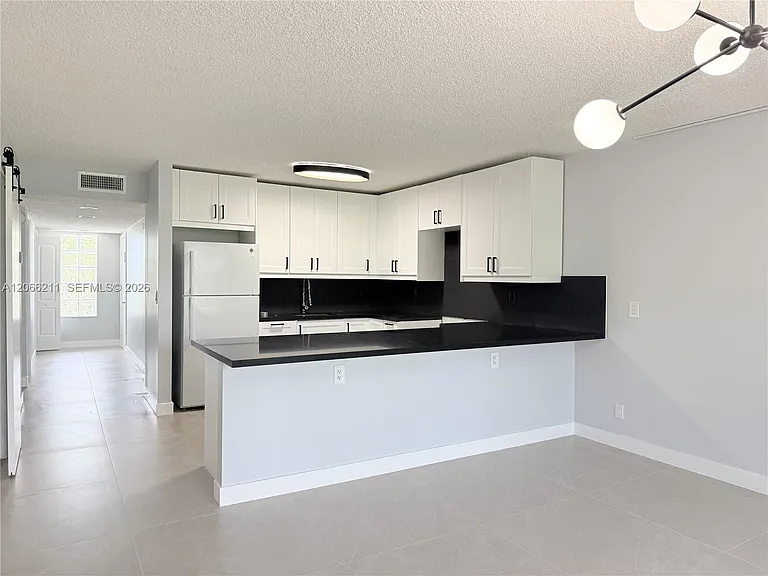 16511 Blatt Blvd #203 — Photo 2