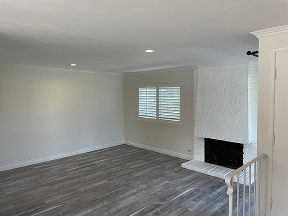 Living room with gas burning fireplace