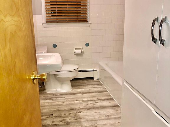 All Newly reglazed bath , there will be a brand new vanity / sink with cabinet replacing sink on the wall