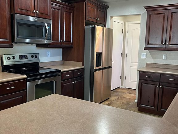Kitchen with stainless steel appliances