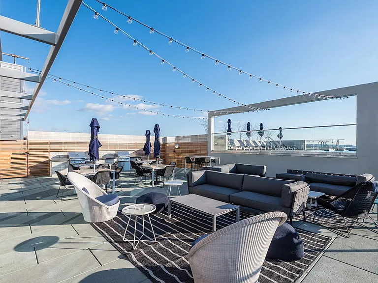 Rooftop deck with pool and grills