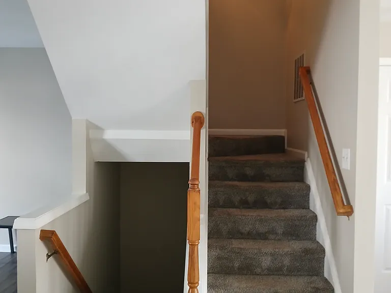 stairs to basement and upstairs bedrooms