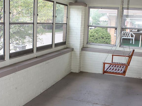 Swing on enclosed porch