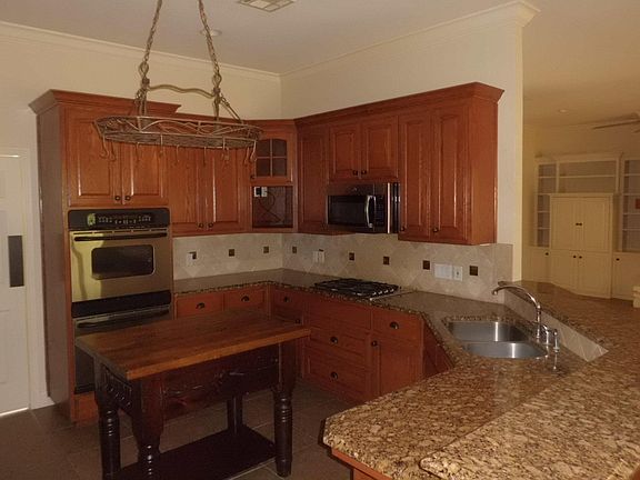 Kitchen with Granite Countertops & Cherry Cabinets