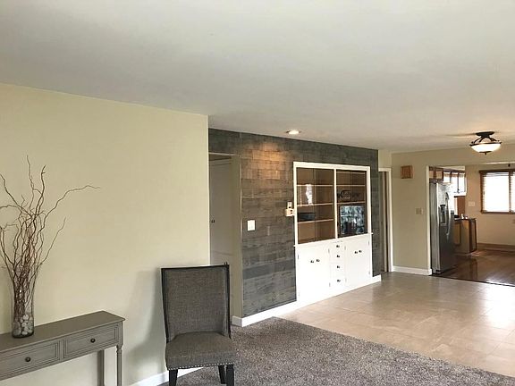 Formal dining with cabinet feature wall