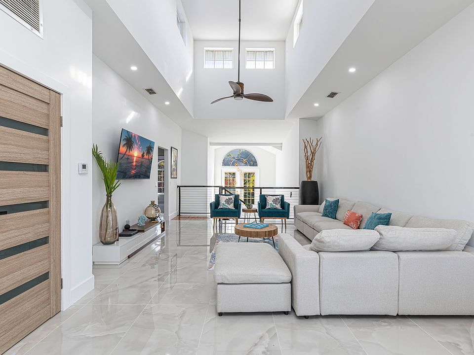 Living Room with smart tv off of kichen area second floor