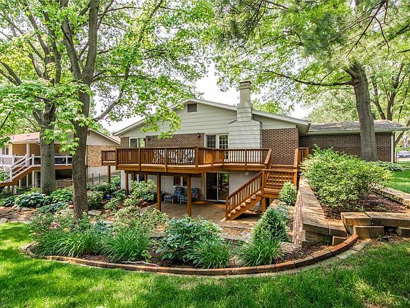 Enjoy your own oasis with professional landscaping, a large deck and privacy.
