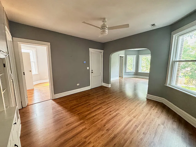 View of front door and second bedroom entrance (far left doorway)