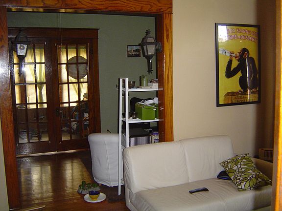 Looking West thru dining room toward sunroom (kitchen and se