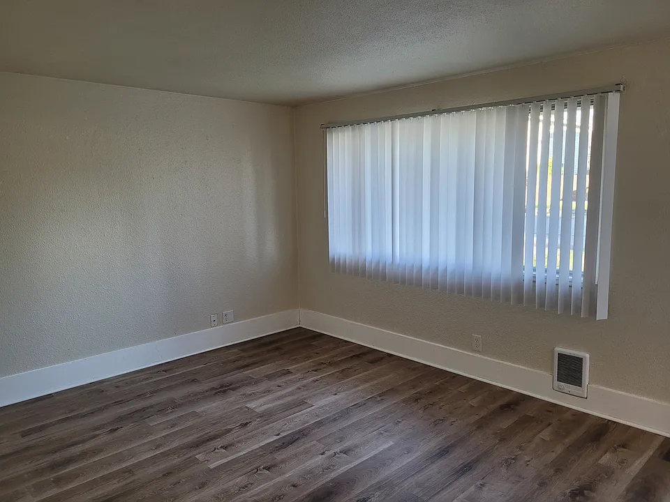 Beautiful living room with new luxurious plank vinyl flooring.