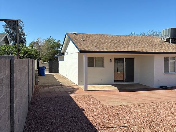 South facing house shot showing large back yard.