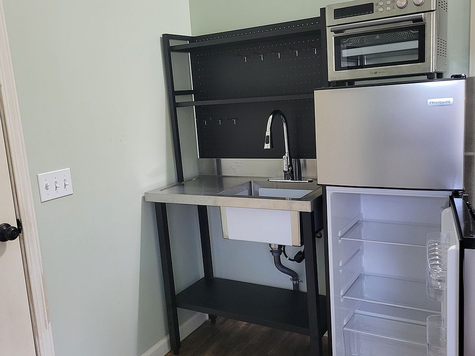 Brand new refrigerator and large convection oven that air-fries and dehydrates. Extra shelf space above sink.