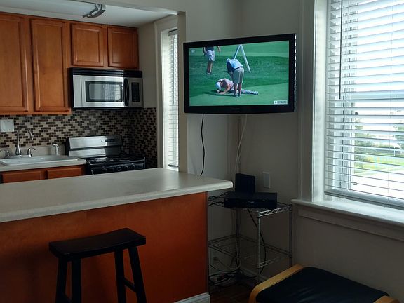 Wall mounted flat screen TV with wifi and DVD