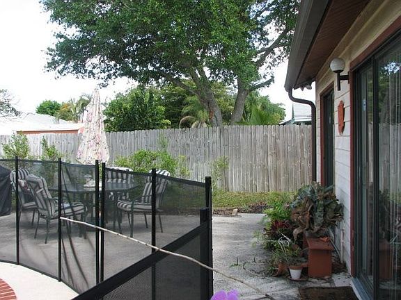 Private pool with sliders from Master and Dining/Living areas 