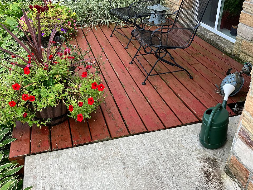 Small 10 x 12 deck off entrance to apartment. A gas grill may be placed on the cement area.