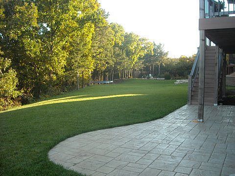 Large backyard with patio and deck