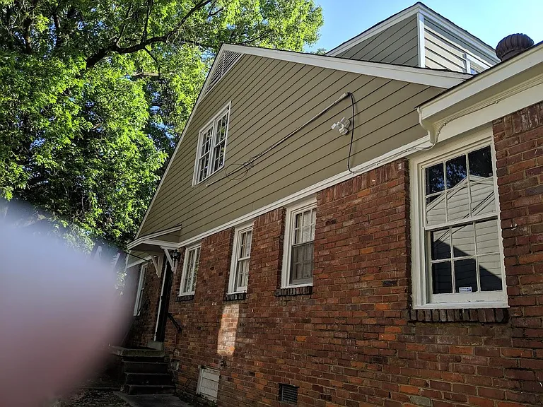 Side entry. Has two motion activated exterior light fixtures.