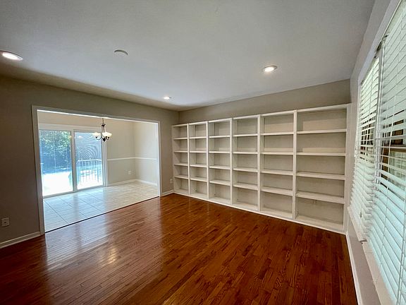 living room with build-in bookshelf