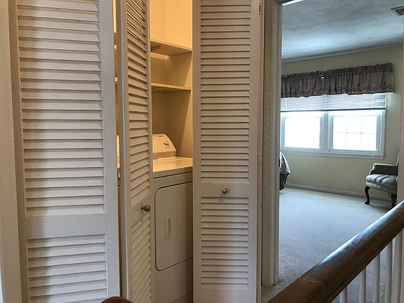 Laundry closet in hallway