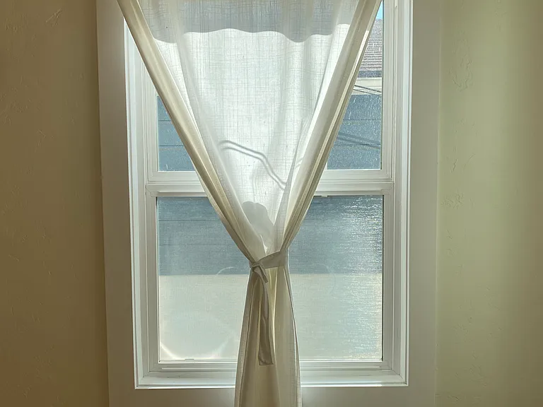double pane Milgard windows, custom curtains (same throughout)